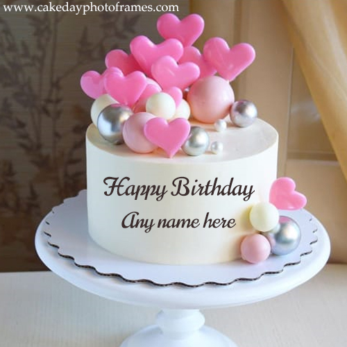 Happy birthday cake with little pink hearts